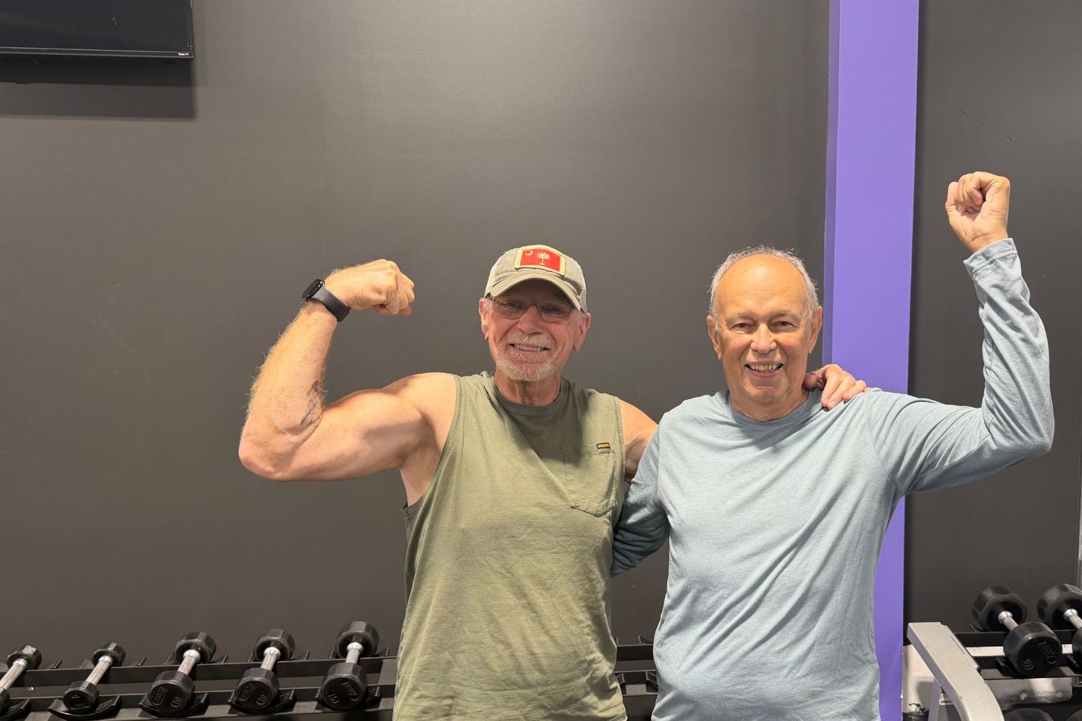 Members celebrating their strength at Ageless Fitness